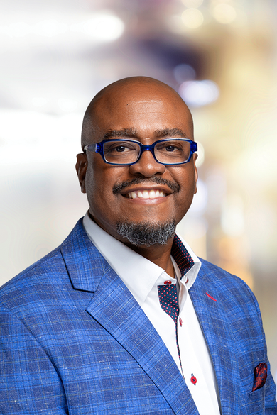 Portrait of Derrick Tucker, REALTOR® | NRLUX.